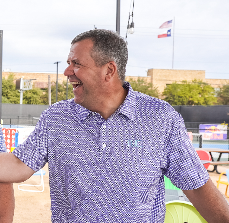 Man wearing Men's Signature Pickleball Paddle Pattern Polo in Lavender