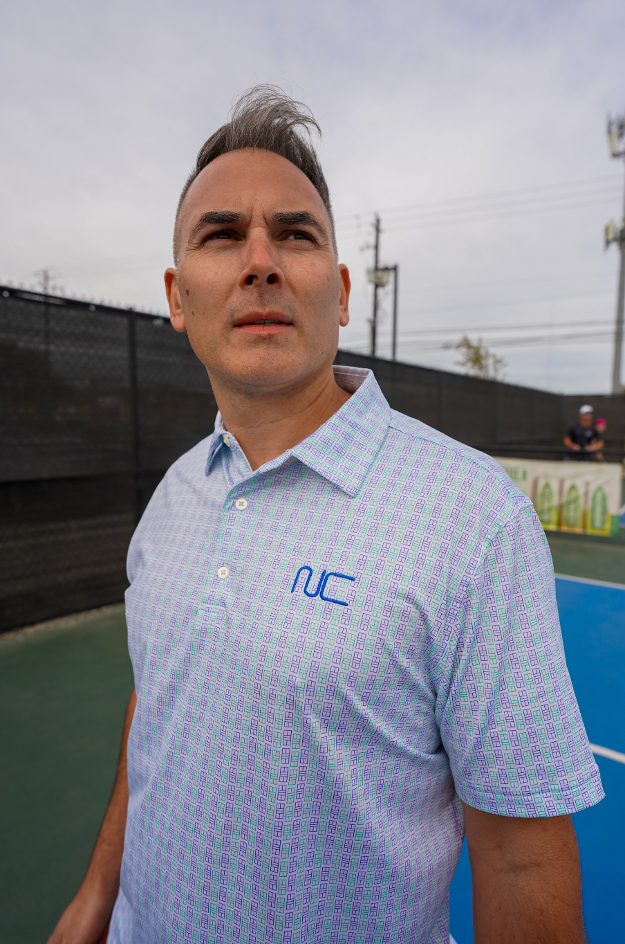 Man wearing Men's Leave it All on the Pickleball Court Polo